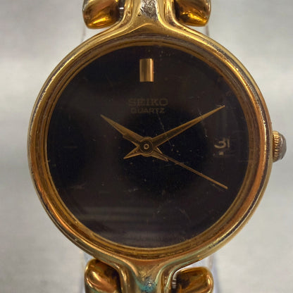 Seiko Watch Women 22mm Black Dial Gold Tone Date Round 7N82-0248 New Battery1