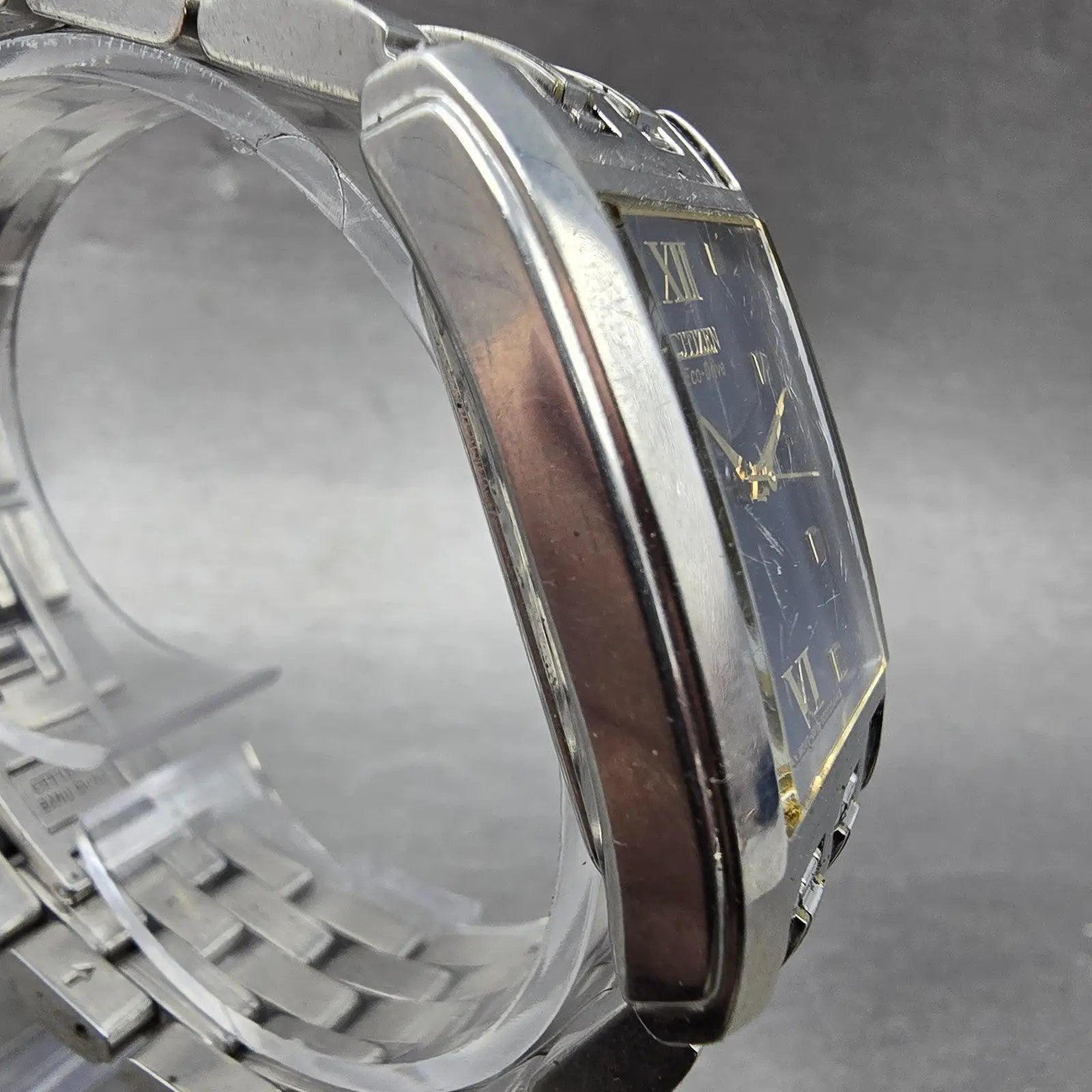 Citizen Eco-Drive Tank Watch Men 27mm Blue Dial Two Tone Date E010-S004004 Runs3