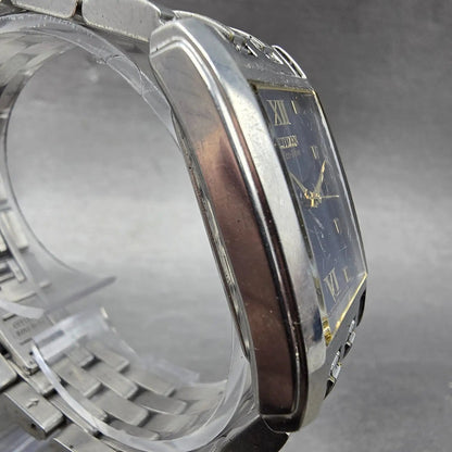 Citizen Eco-Drive Tank Watch Men 27mm Blue Dial Two Tone Date E010-S004004 Runs3