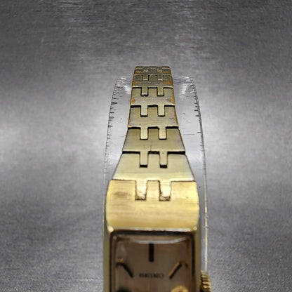Seiko Tank Watch Women 12mm Champagne Dial Gold Tone Rectangle Manual Wind Runs4
