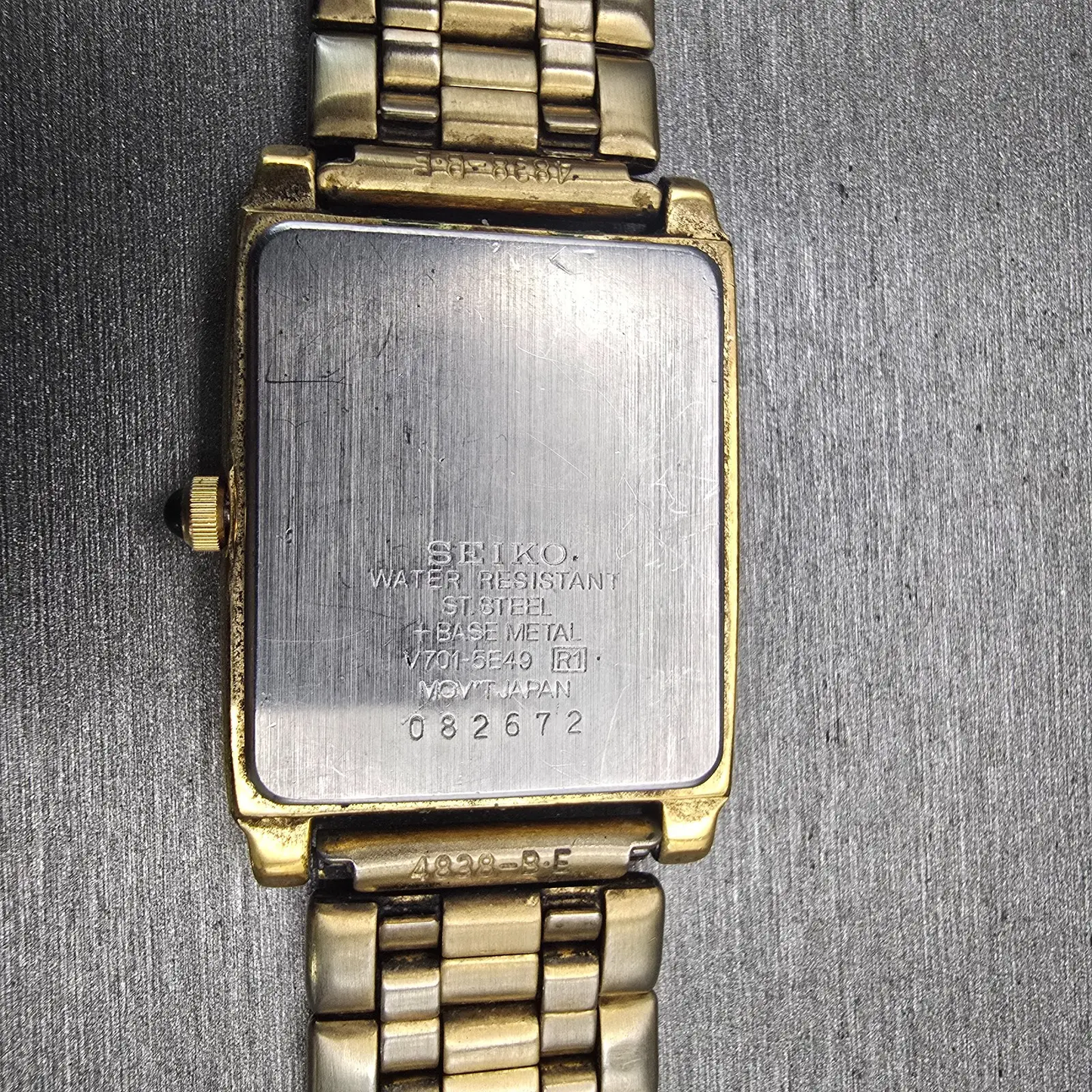 Seiko Watch Men 26mm Black Dial Gold Tone Rectangle V701-5E49 New Battery VTG10