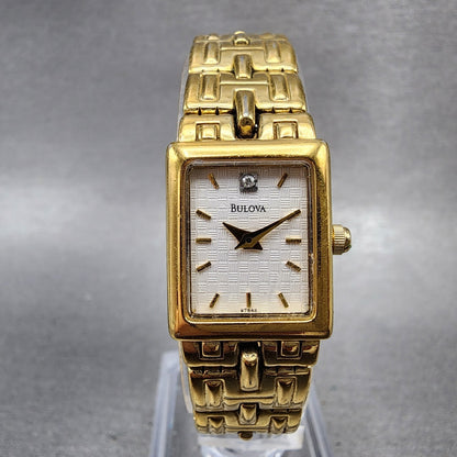 Bulova Tank Watch Women 16mm White Dial Gold Tone Rectangle 97S42 New Battery0
