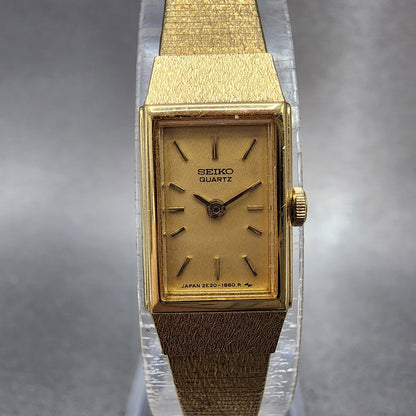 Seiko Tank Watch Women 12mm Champagne Dial Gold Tone 2e206479 New Battery0