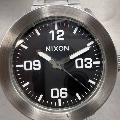 Nixon The Private Watch Men 42mm Black Dial Silver Tone Round Bracelet New Batt1