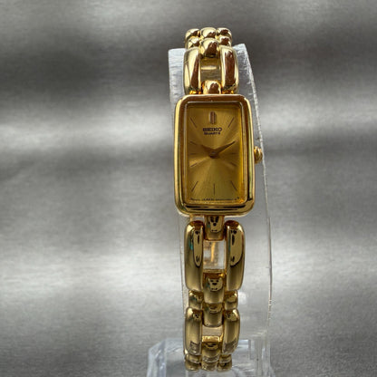Seiko Tank Watch Women 13mm Champagne Dial Gold Tone Rectangle 2E207108 New Bat5