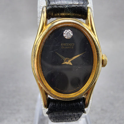 Seiko Watch Women 16mm Black Dial Gold Tone Oval 2c206399 New Battery1