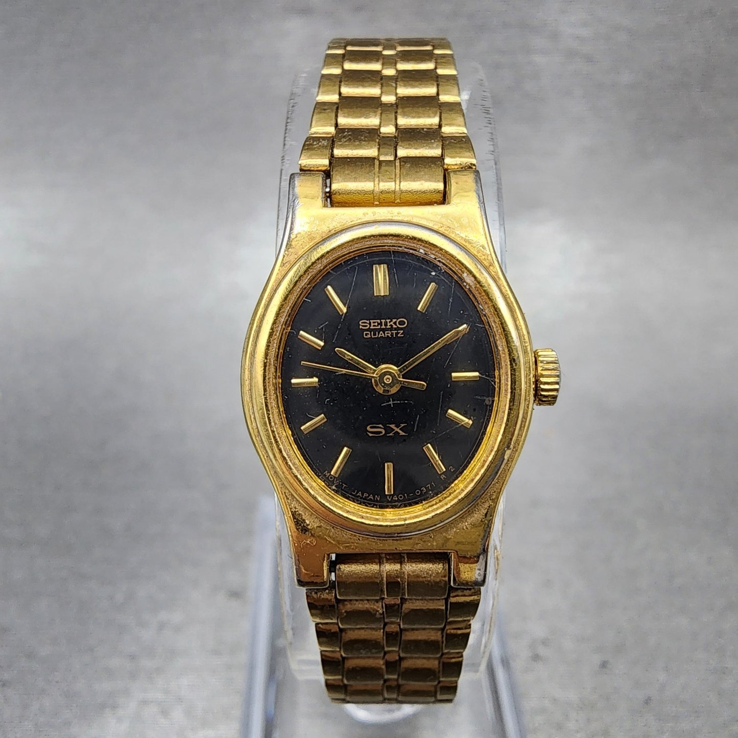 Seiko SX Watch Women 17mm Black Dial Gold Tone Oval V4015101 New Battery0
