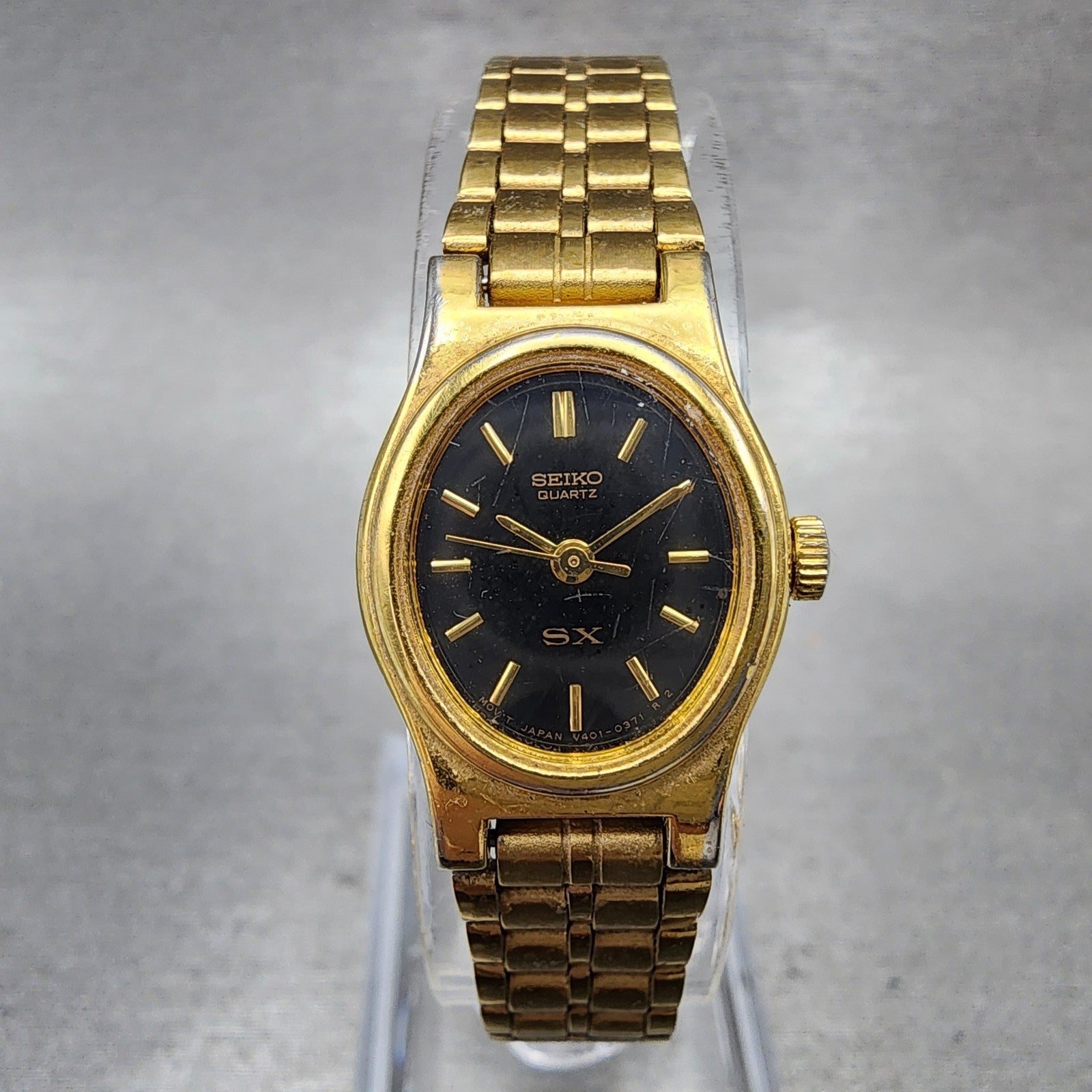 Seiko SX Watch Women 17mm Black Dial Gold Tone Oval V4015101 New Battery0