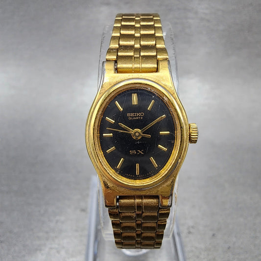 Seiko SX Watch Women 17mm Black Dial Gold Tone Oval V4015101 New Battery0