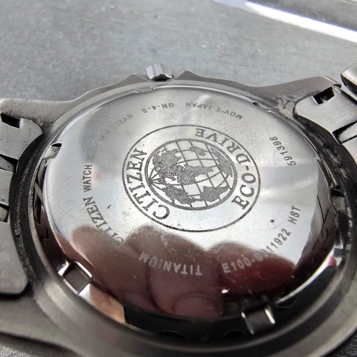 Citizen Eco-Drive Watch Men 42mm Black Dial Titanium Daydate E100-S011922 Runs9