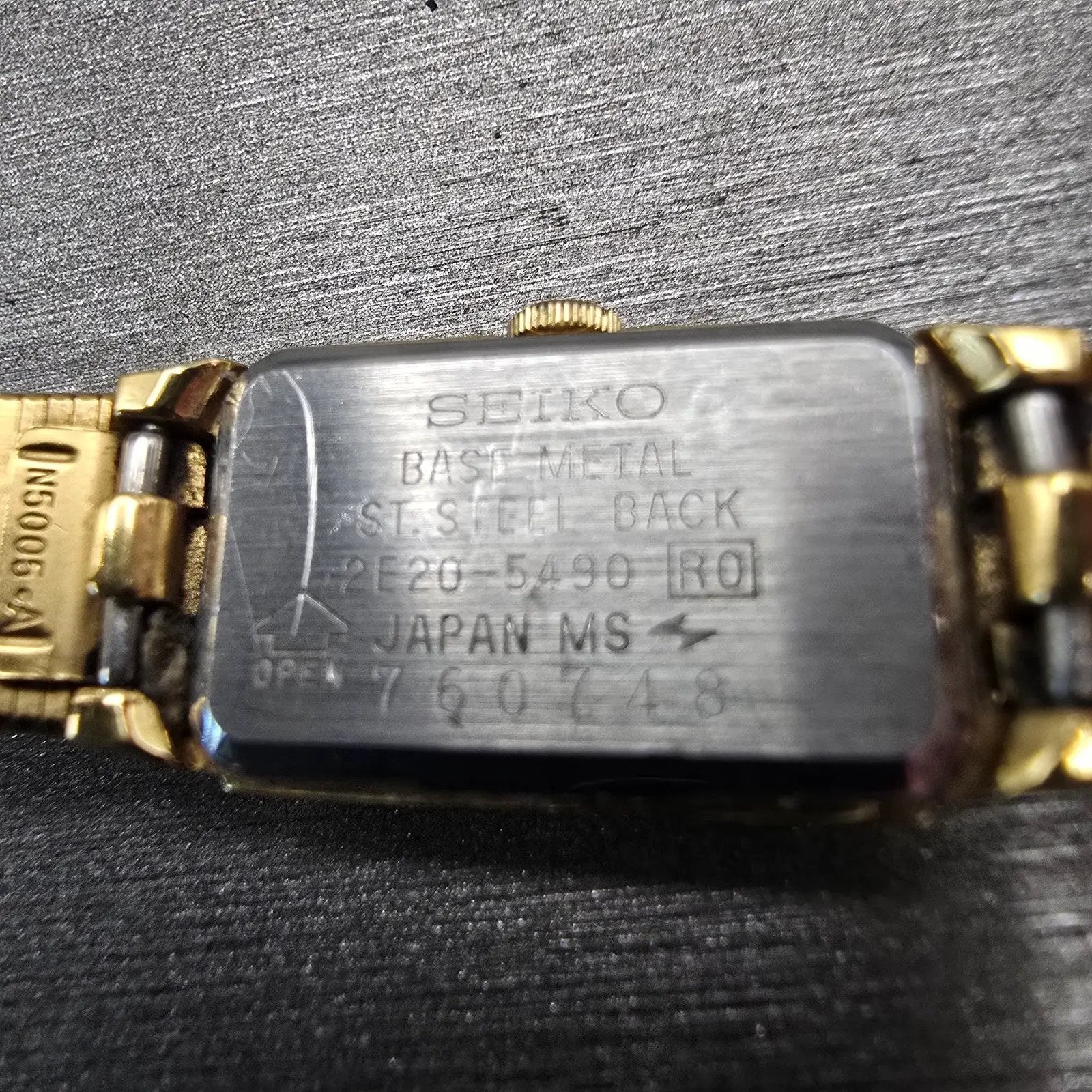 Seiko Watch Women 12mm Black Dial Gold Tone Rectangle 2E20-5490 New Battery VTG10