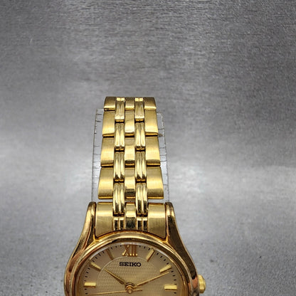 Seiko watch Women 24mm Champagne Dial Gold Tone Round V4011600 New Battery4