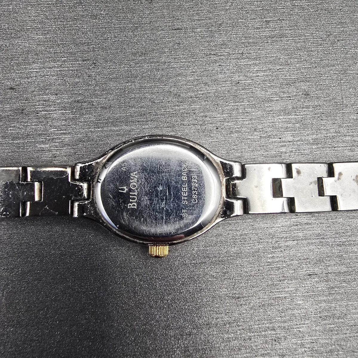 Bulova Watch Women 17mm White Dial Two Tone Oval 98T92 New Battery JP2310