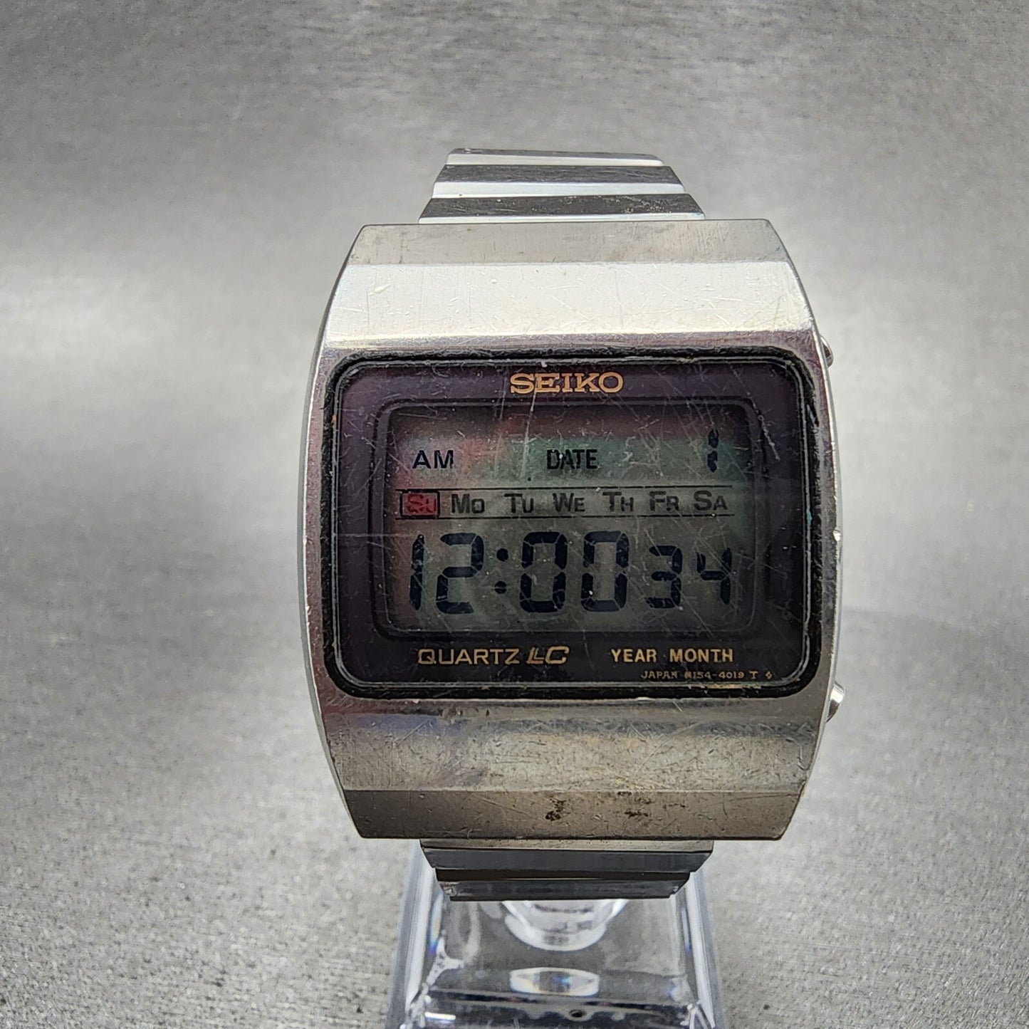 Seiko Digital Watch Men 34mm LCD Silver Tone Rectangle M1544019 PARTS0