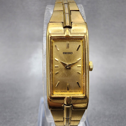 Seiko Tank Watch Women 13mm Champagne Dial Gold Tone 2e207479 New Battery0