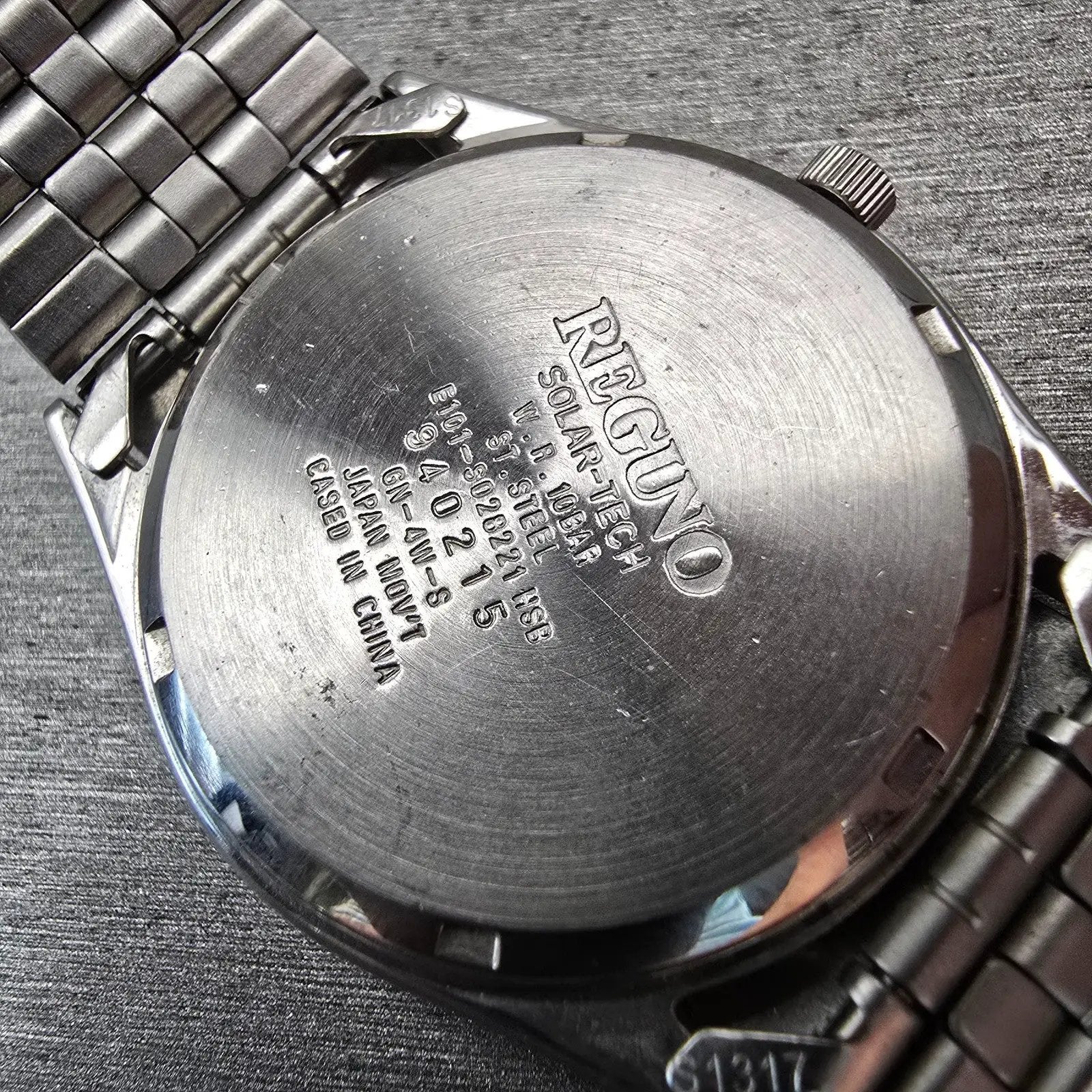 Reguno Solar-Tech Watch Men 36mm White Dial Silver Daydate E101-S028221 Works10