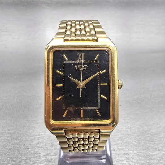 Seiko Watch Men 26mm Black Dial Gold Tone Rectangle V701-5J09 New Battery VTG0
