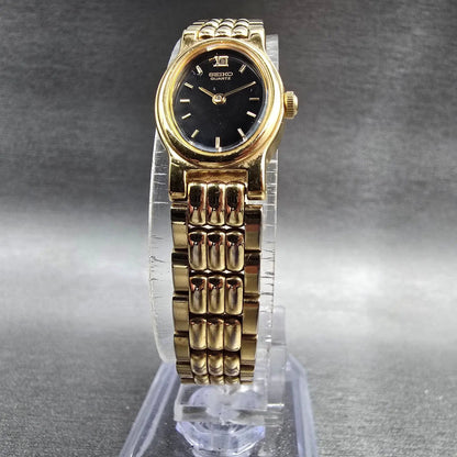 Seiko Watch Women 14mm Black Dial Gold Tone Oval 1F20-5B99 New Battery Vintage P5