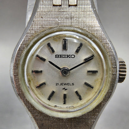 Seiko Watch Women 18mm Silver Dial White Gold Tone Round Manual Wind Runs VTG1