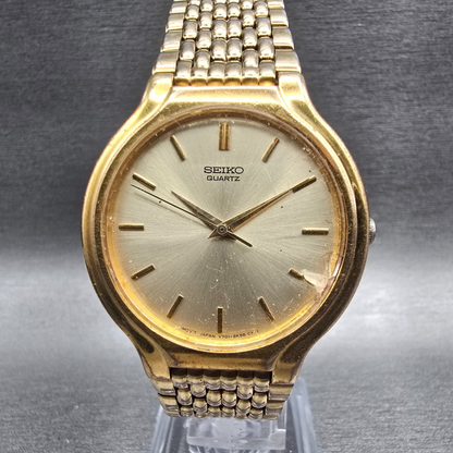 Seiko Watch Men 34mm Champagne Dial Gold Tone Round V701-6J60 New Battery VTG0