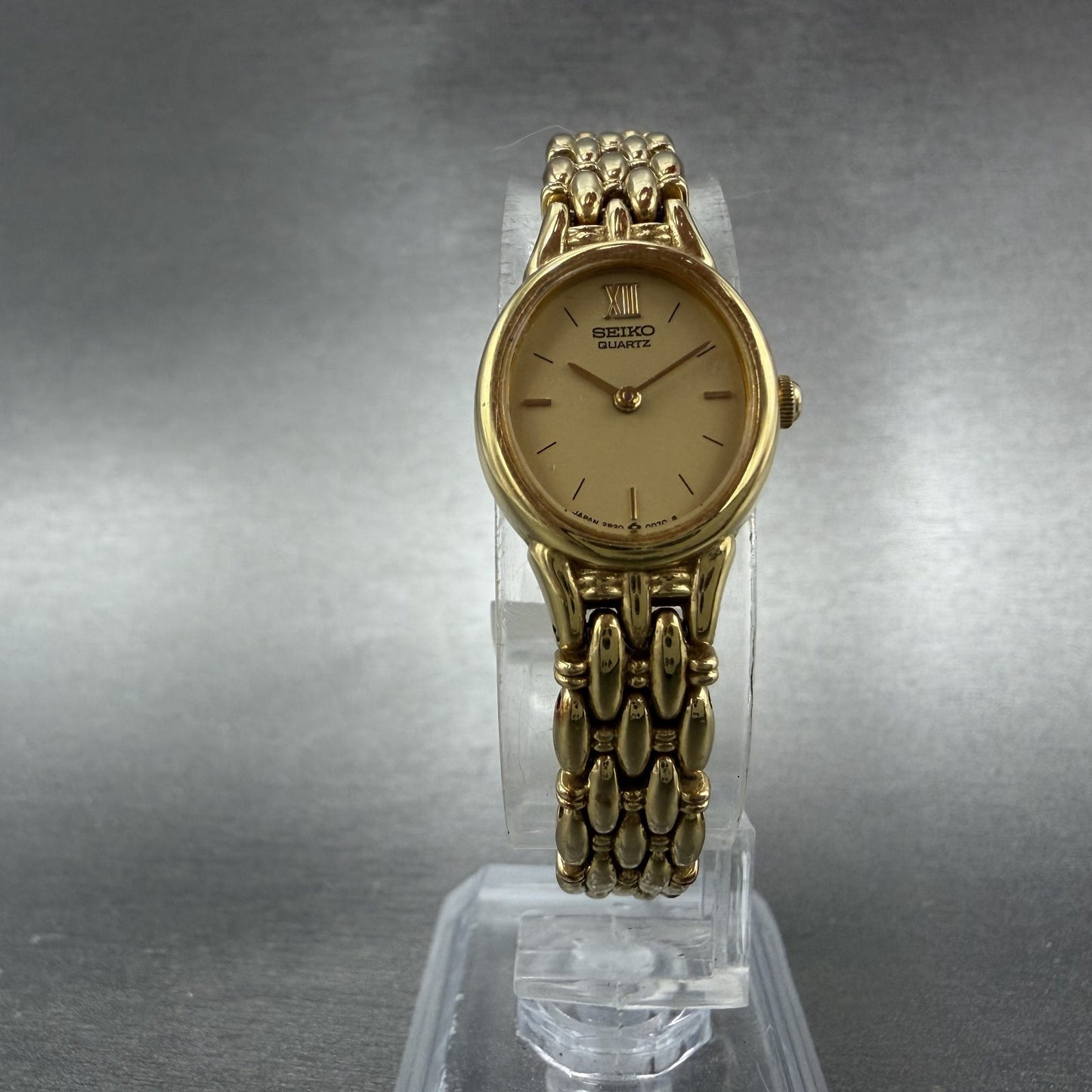 Seiko Watch Women 17mm Champagne Dial Gold Tone Oval 2P20-5B09 New Battery5