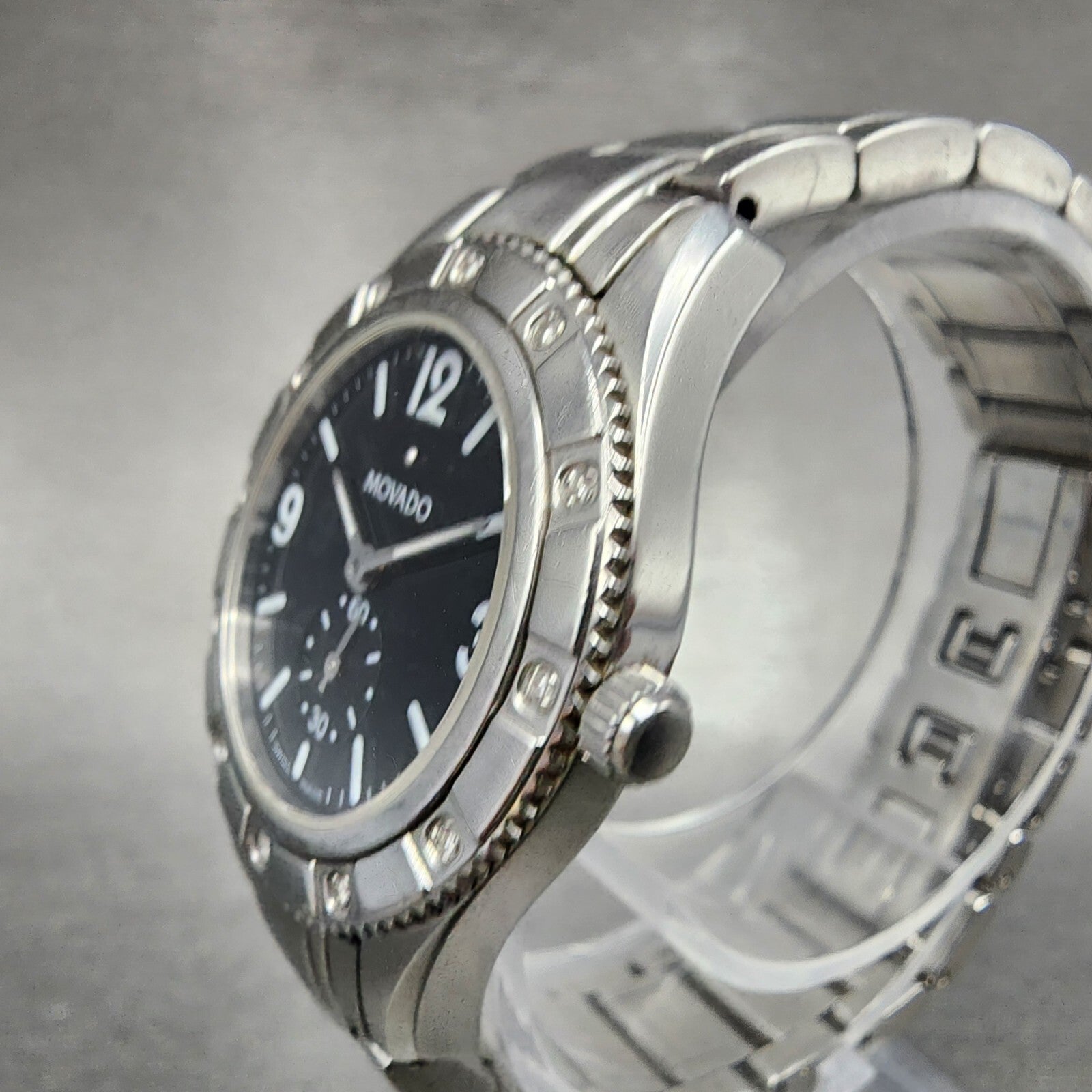 Movado Gentry Watch Women 28mm Black Dial Silver Tone Round 84 E9 1860 New Batt2