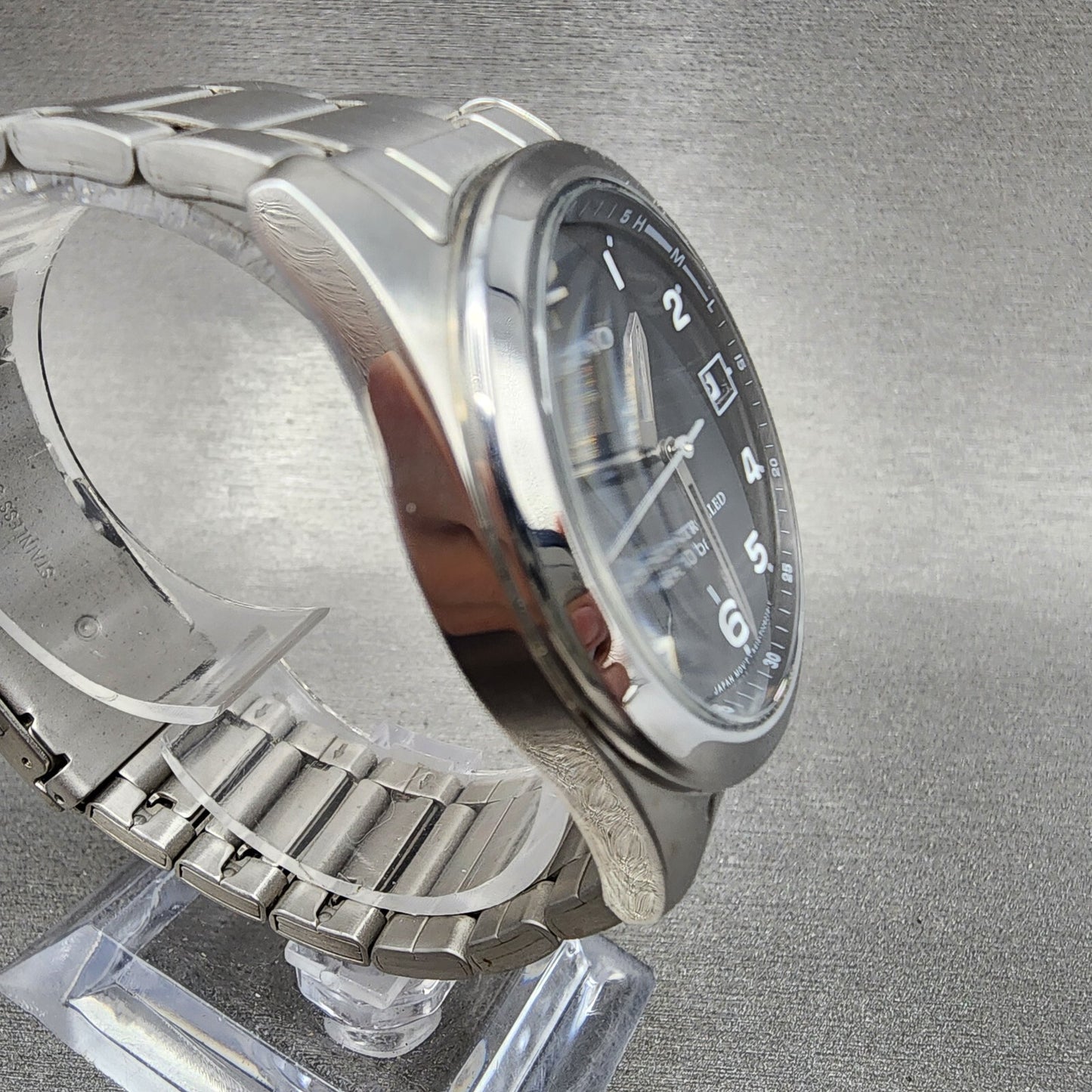 Reguno Watch Men 37mm Black Dial Silver Tone Date Solar H415T017274 Works5
