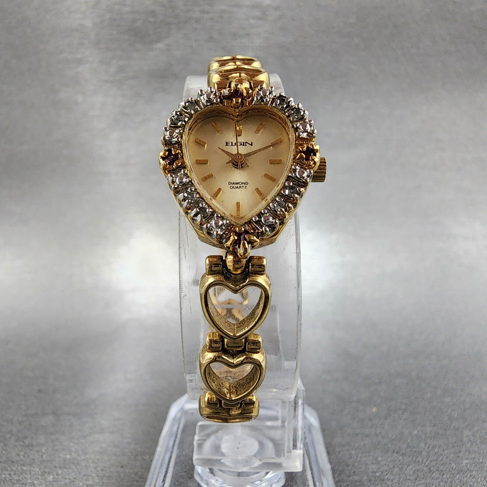 Elgin Heart Watch Women 19mm Champagne Dial Gold Tone Ruby Diamond Bezel New Bat5