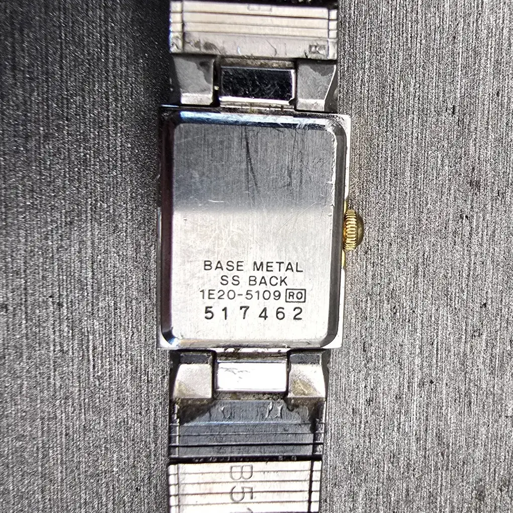 Seiko Watch Women 13mm Silver Dial Two Tone Rectangle 1E20-5109 New Battery VTG10