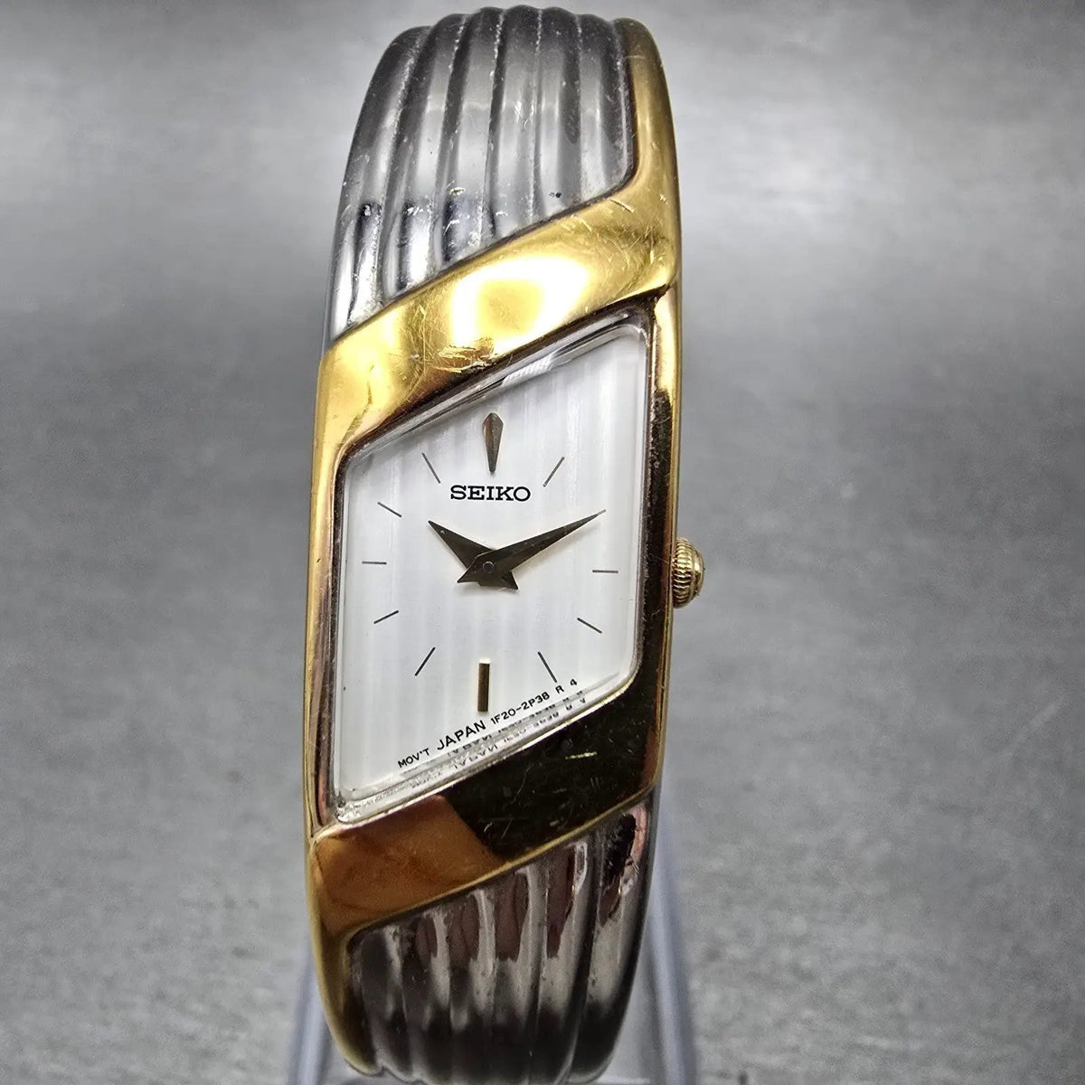 Seiko  Watch Women 15mm White Dial Two Tone Rectangle Bangle 1f20-6f60 New Batt1