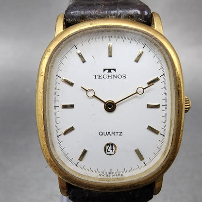 Technos Watch Women 23mm White Dial Gold Tone Date Oval 51178 New Battery1