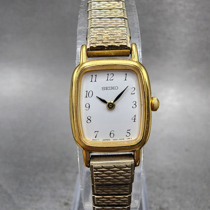Seiko Watch Women 18mm White Dial Gold Tone Rectangle 1N005K29 New Battery0