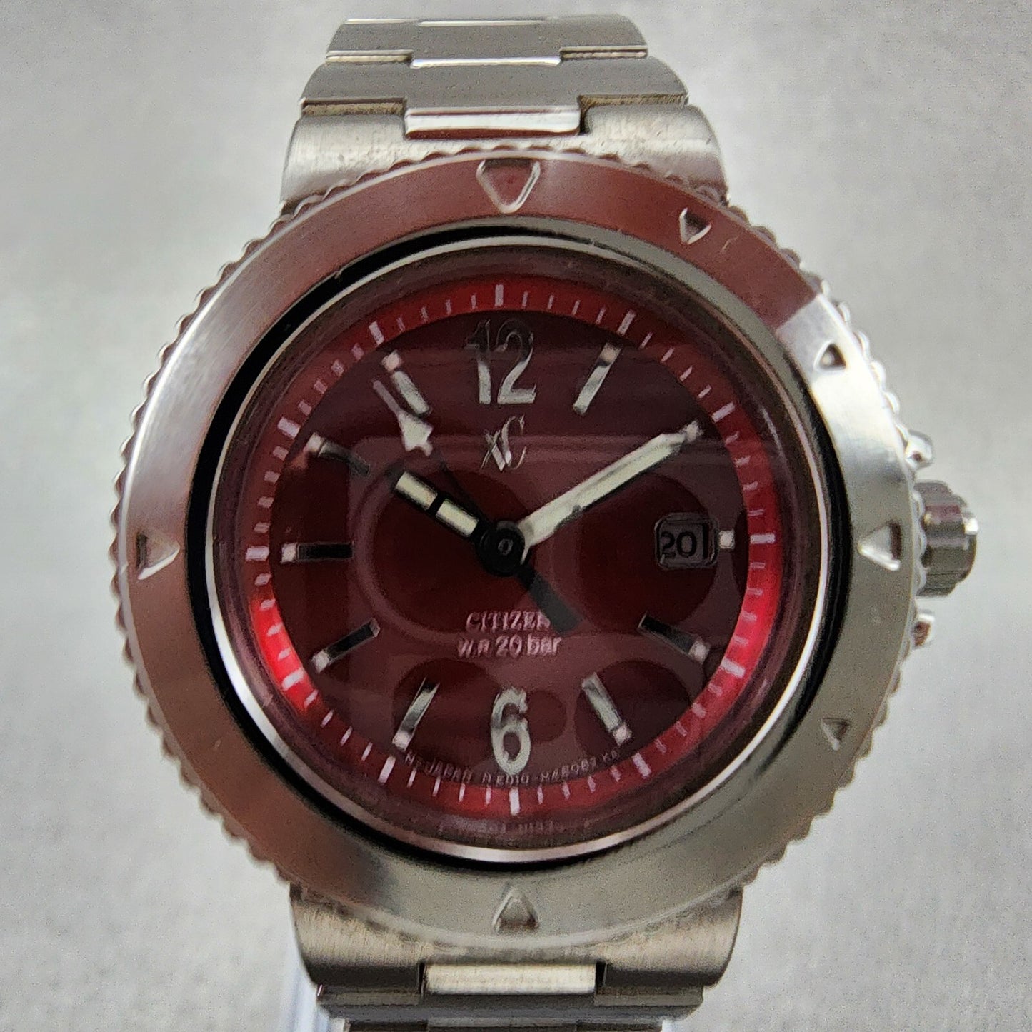 Citizen EcoDrive XC Dive Watch Women 31mm Red Dial Steel Date Round Runs1