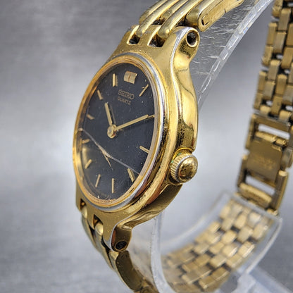 Seiko Watch Women 22mm Black Dial Gold Tone Round 1N000A99 CRACKED New Battery2
