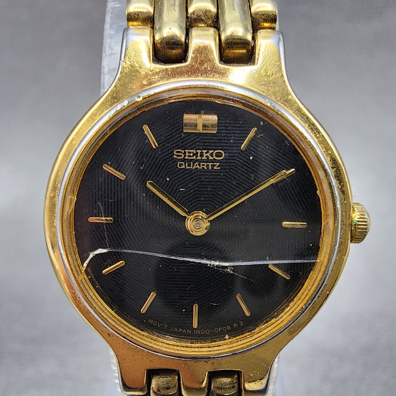 Seiko Watch Women 22mm Black Dial Gold Tone Round 1N000A99 CRACKED New Battery1