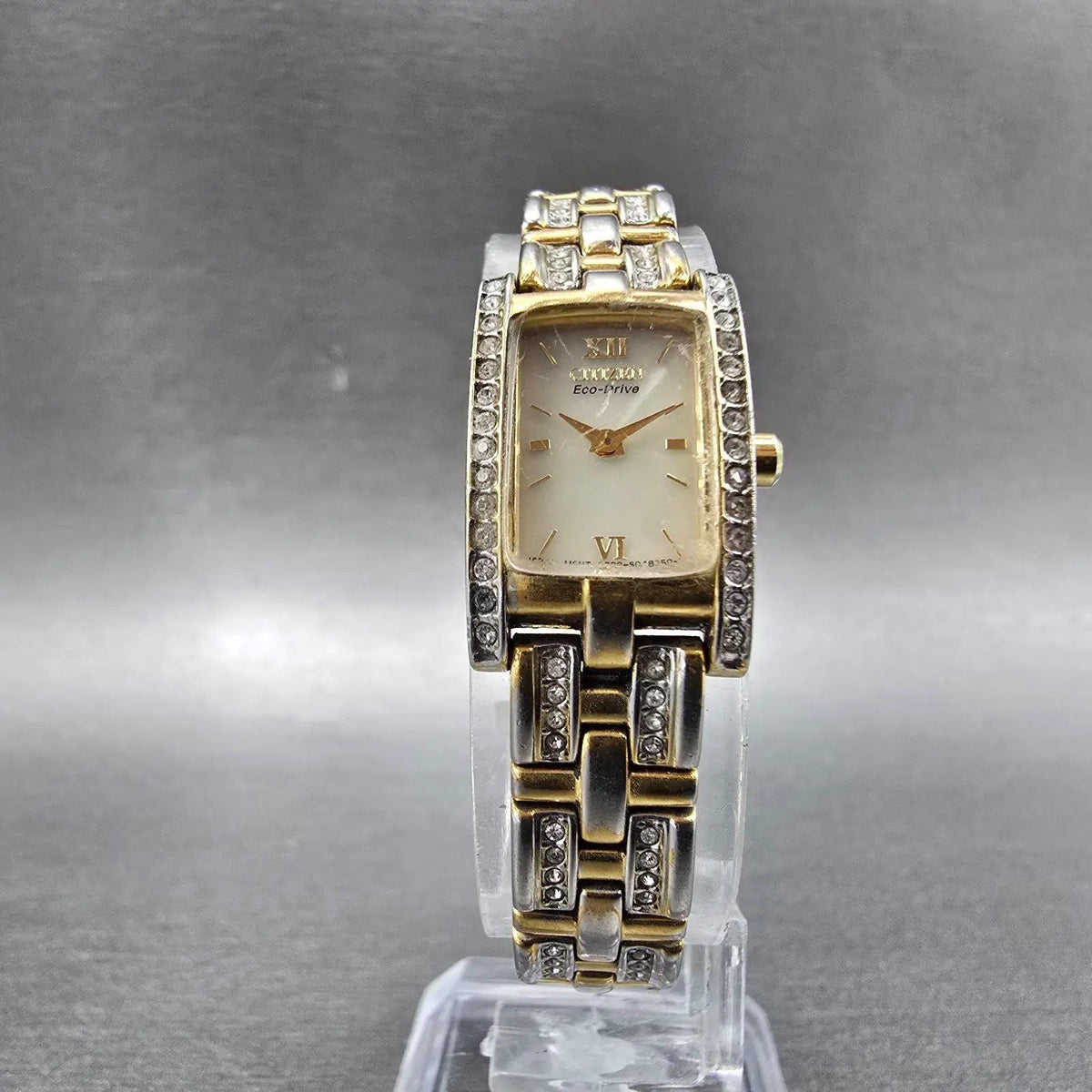 Citizen Eco-Drive Tank Watch Women 15mm White Dial Gold Tone Crystal Bezel Runs5