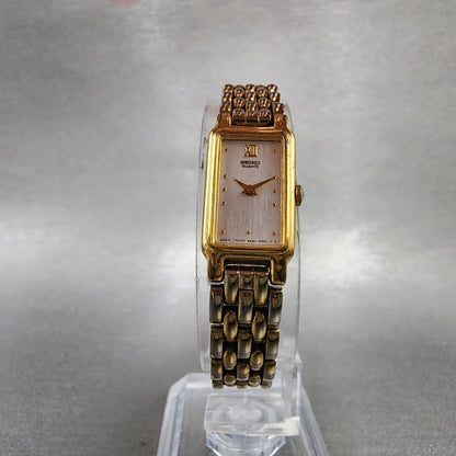 Seiko Tank Watch Women 13mm Silver Tone Gold Tone Rectangle 2e206859 NewBattery5