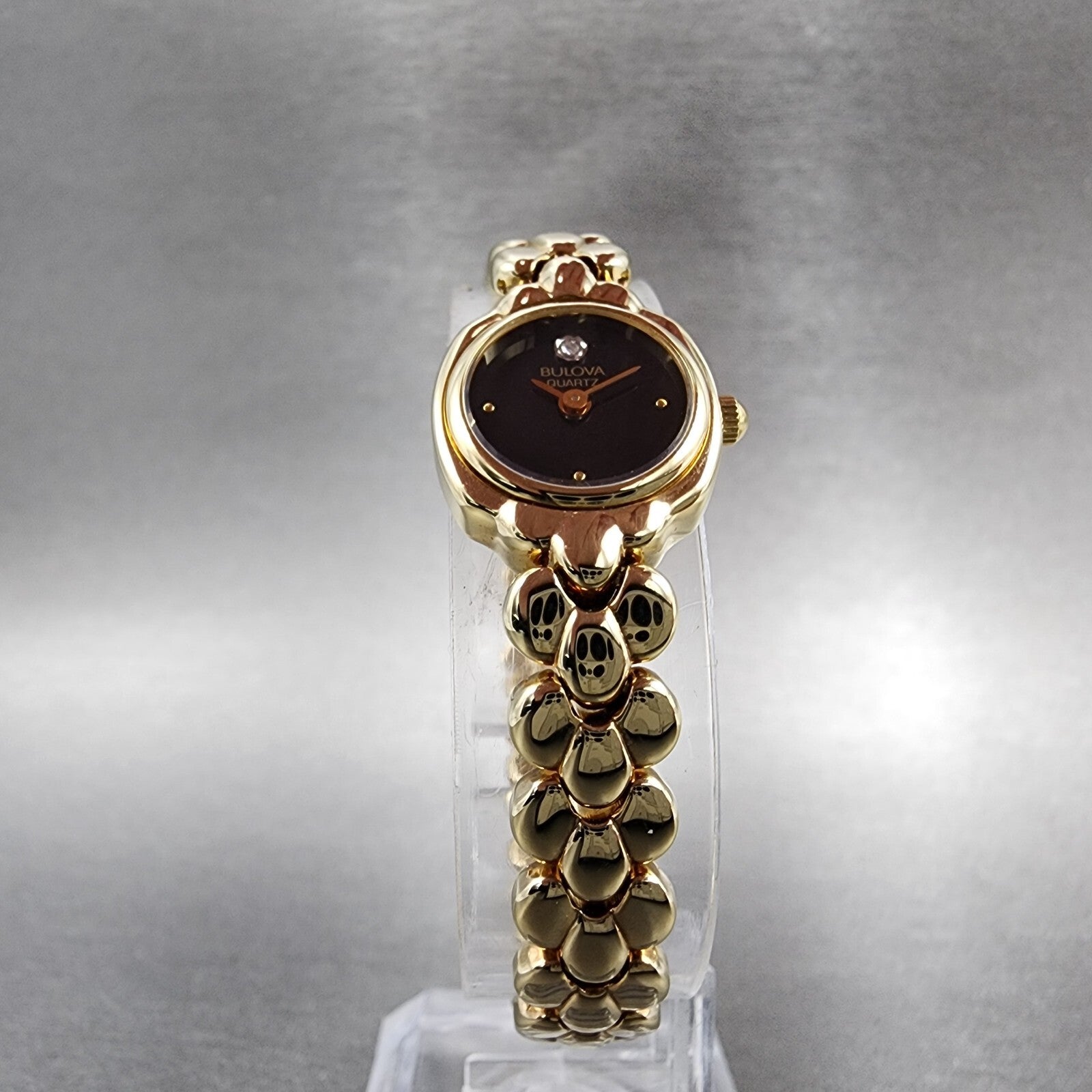 Bulova Watch Women 17mm Black Dial Gold Tone Round 92F59 New Batt NOS7
