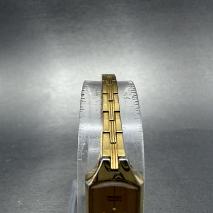 Seiko Watch Women 12mm Champagne Dial Gold Tone Rectangle 2E20-5179 New Batt IJI4