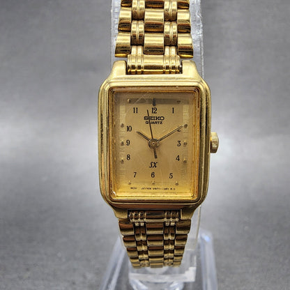 Seiko SX Tank Watch Women 17mm Champagne Dial Gold Tone V4015121 New Battery0