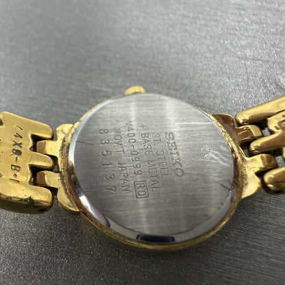 Seiko Watch Women 20mm White Dial Gold Tone Round V400-0990 New Battery ABC9