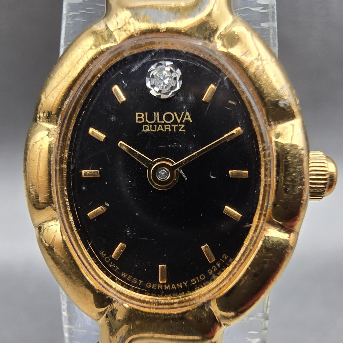 Bulova Watch Women 16mm Black Dial Gold Tone Oval 92F12 New Battery Diamonds VTG1