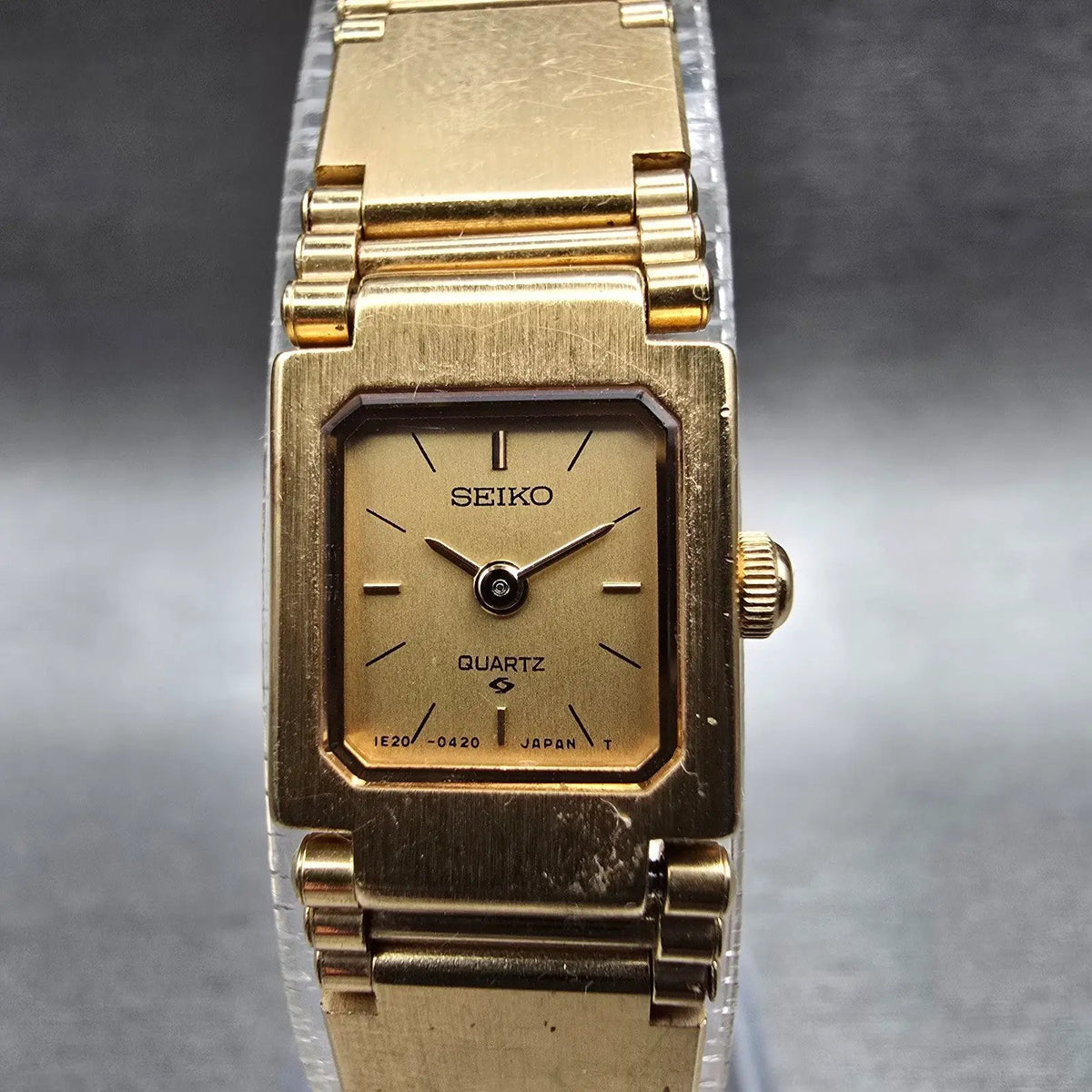Seiko Watch Women 13mm Gold Dial Gold Tone Rectangle 1E20-5200 New Battery1