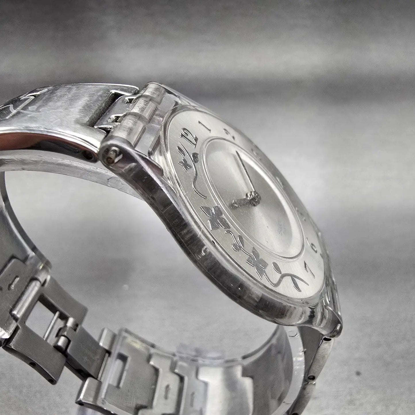 Swatch Skin CLIMBER FLOWERY Watch Women Silver Dial Clear Case SFK300G New Batt3