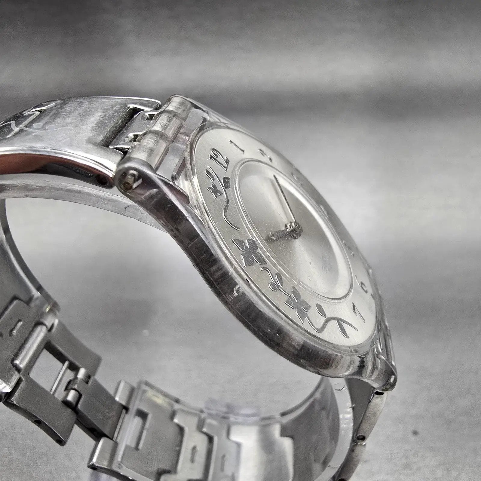 Swatch Skin CLIMBER FLOWERY Watch Women Silver Dial Clear Case SFK300G New Batt3