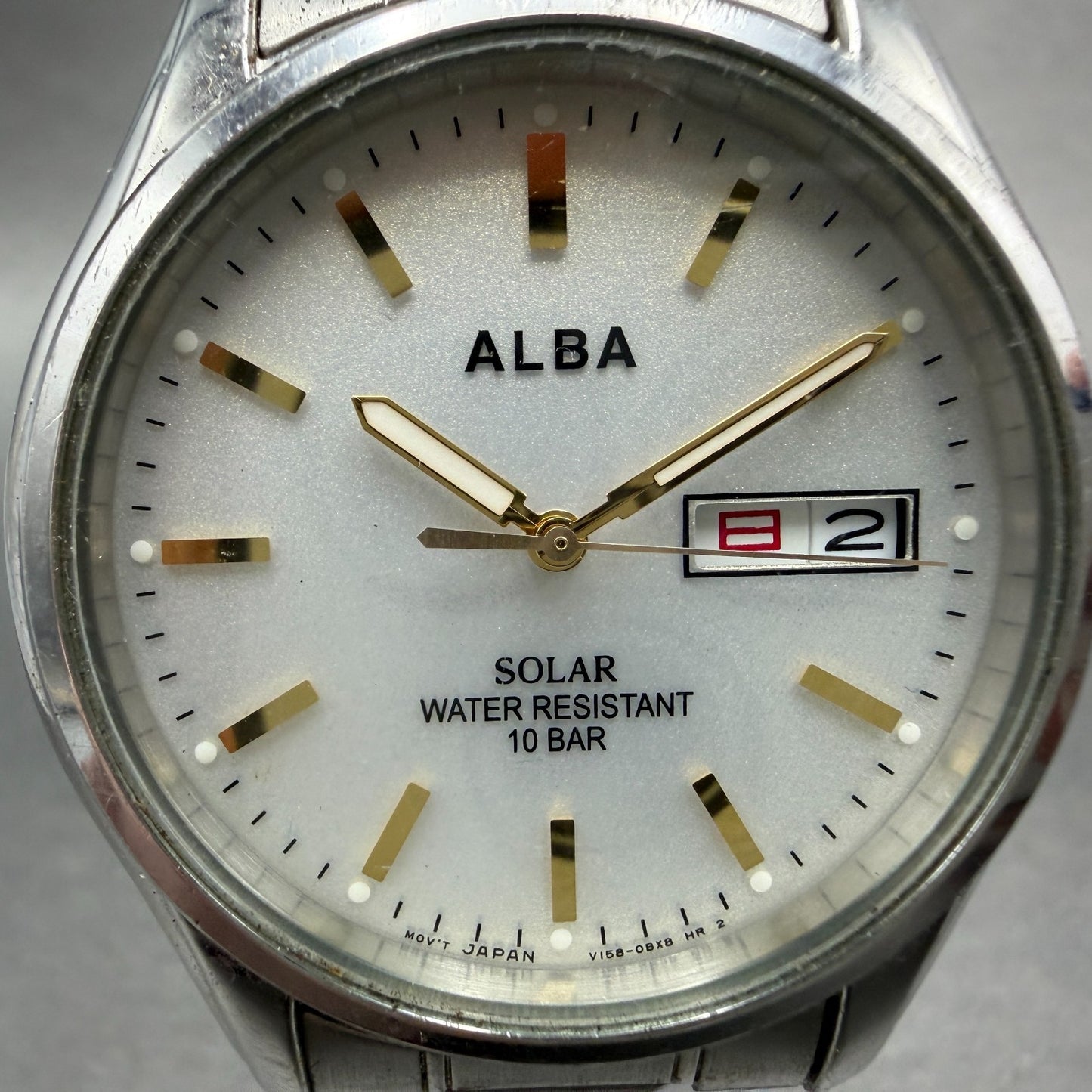 Seiko Alba Solar Watch Men 36mm Silver Dial Silver Tone Daydate V158-0AX0 Runs1