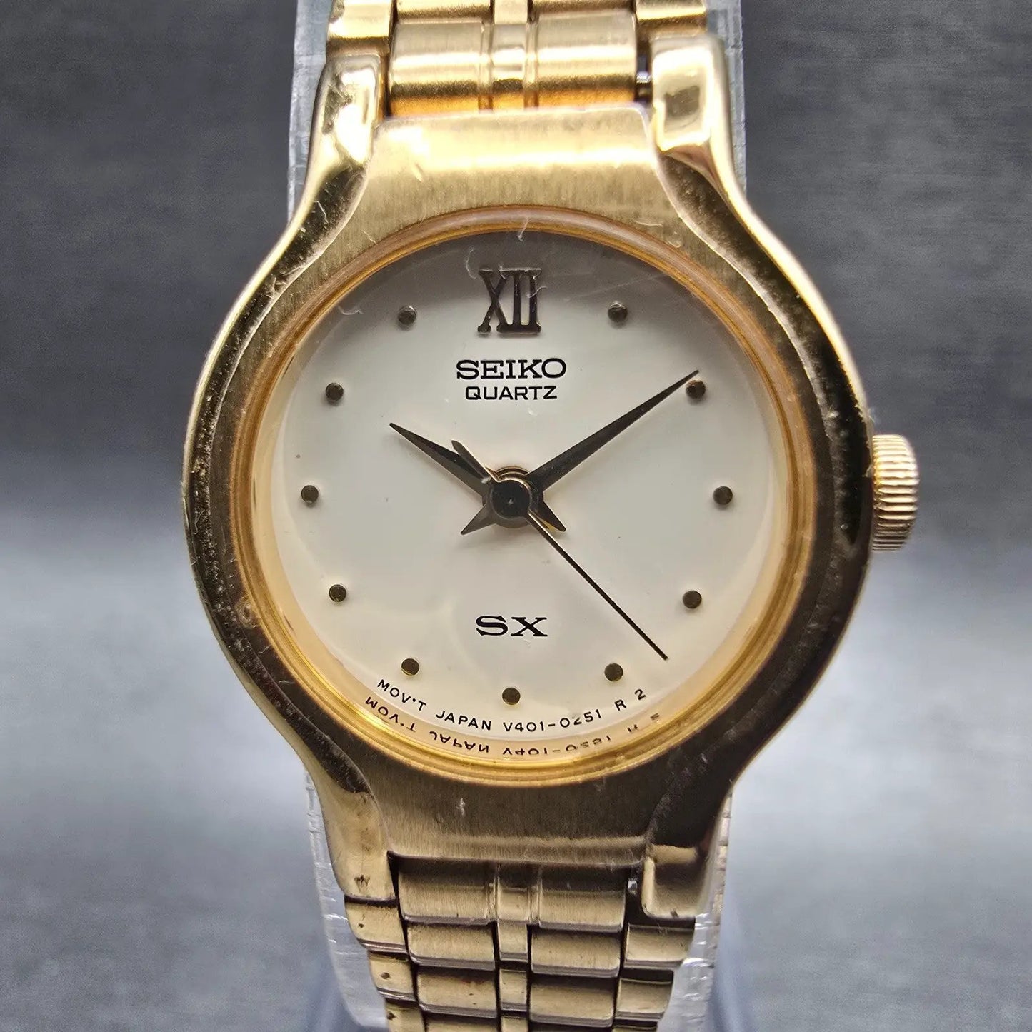 Seiko SX Watch Women 19mm Champagne Dial Gold Tone Round V401-0091 New Battery G1