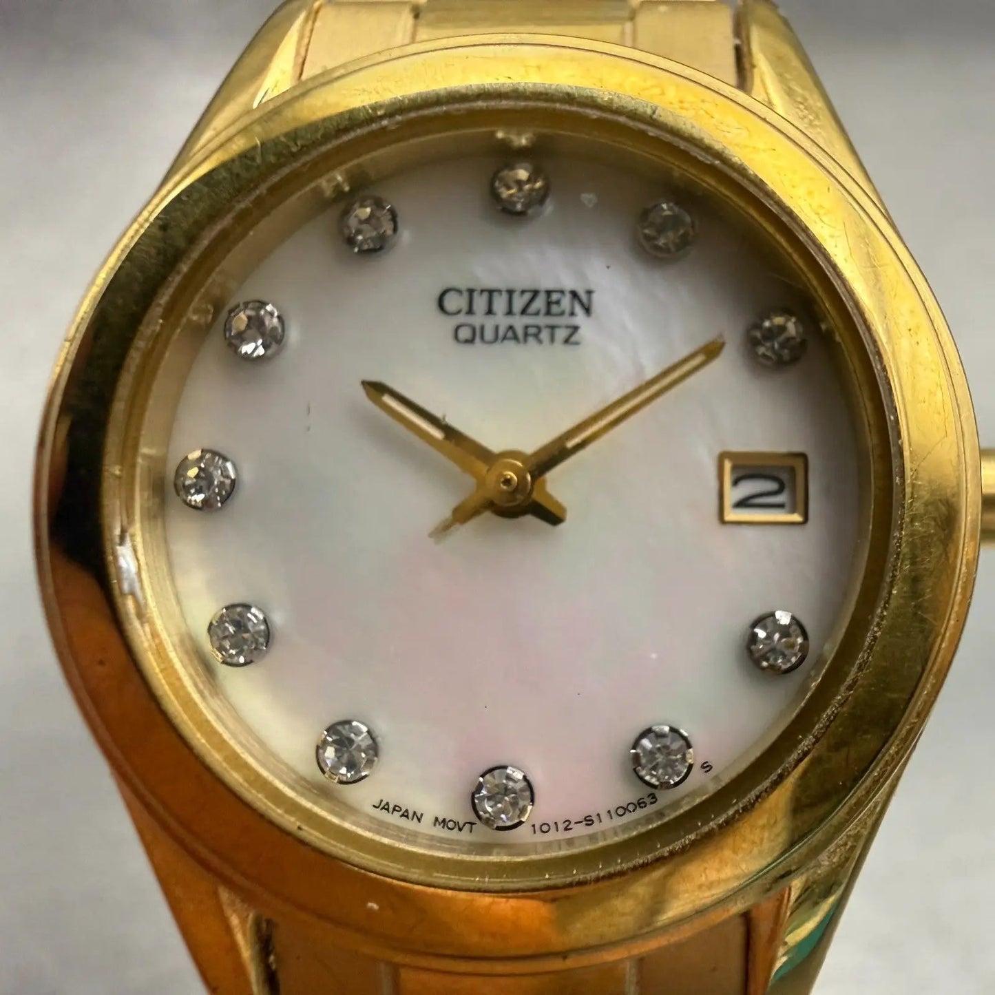 Citizen Watch Women 26mm MOP Dial Gold Gemmed Date Round 1012-S075688 New Batt1