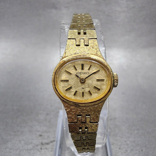 Seiko Watch Women 17mm Champagne Dial Gold Tone Manual Wind Round 117619 Runs0