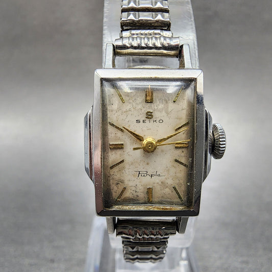 Seiko Purple Watch Women 14mm Cream dial Silver Tone Manual Wind Runs 5219